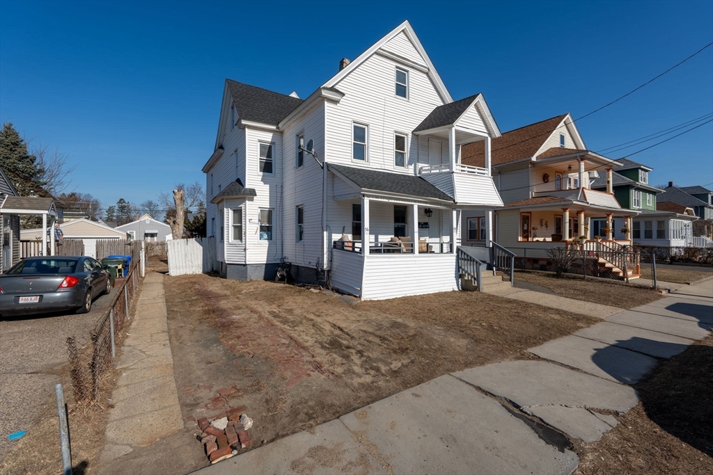 58 Governor Street Springfield, MA 01104 - Photo 1 of 23 a view of multiple houses with a street