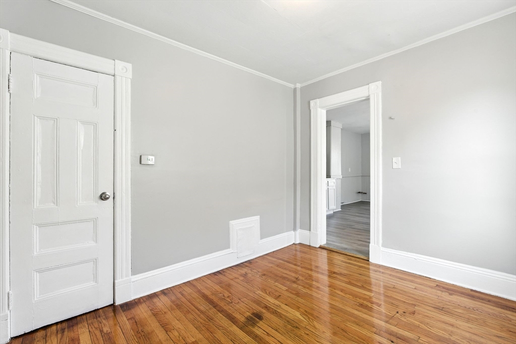 58 Governor Street Springfield, MA 01104 - Photo 20 of 23 wooden floor in an empty room