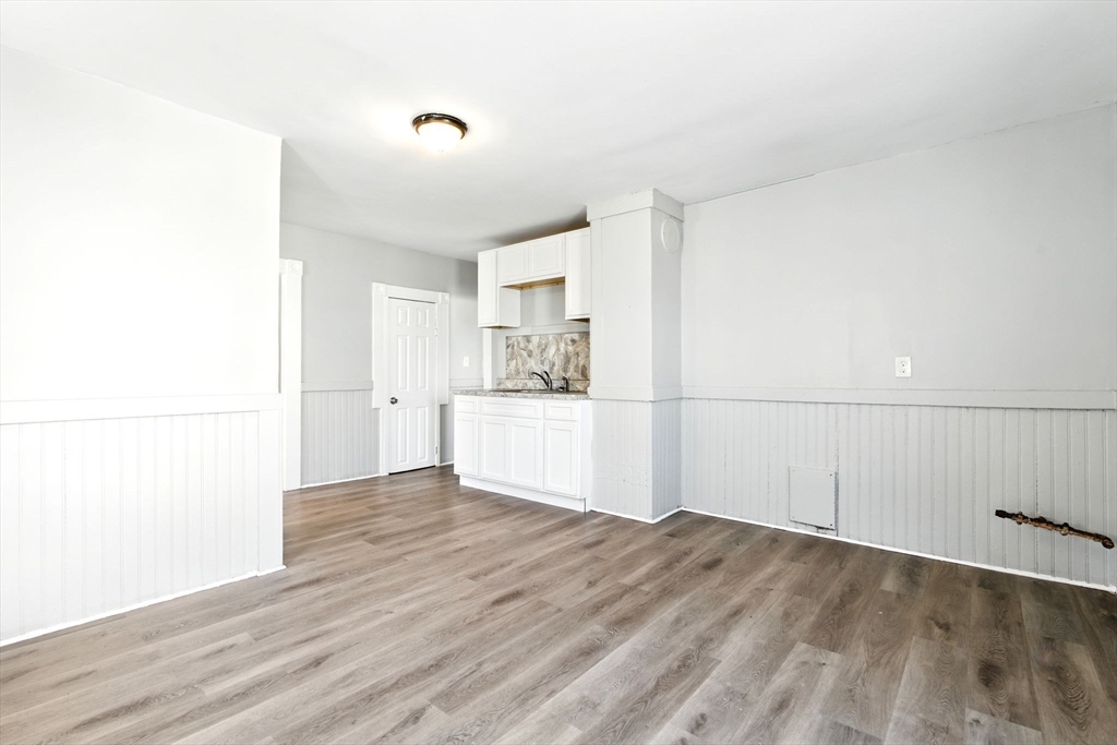 58 Governor Street Springfield, MA 01104 - Photo 2 of 23 a view of a kitchen with wooden floor