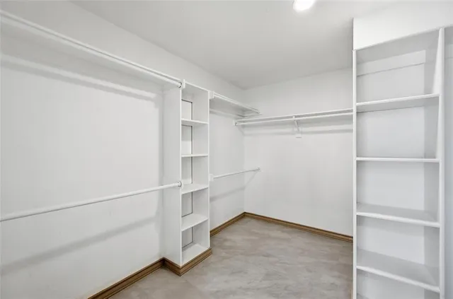 a view of an empty walk in closet