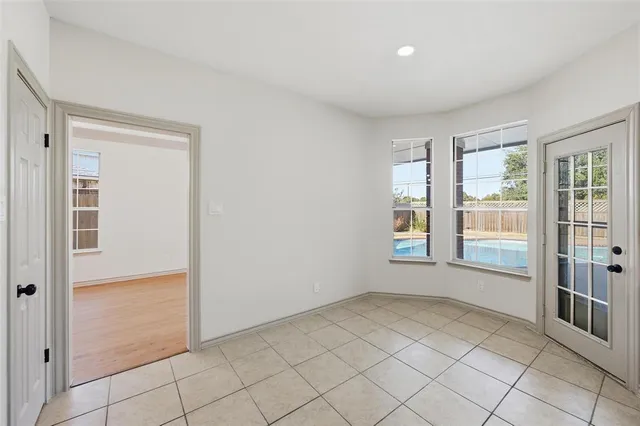 a view of an empty room and window