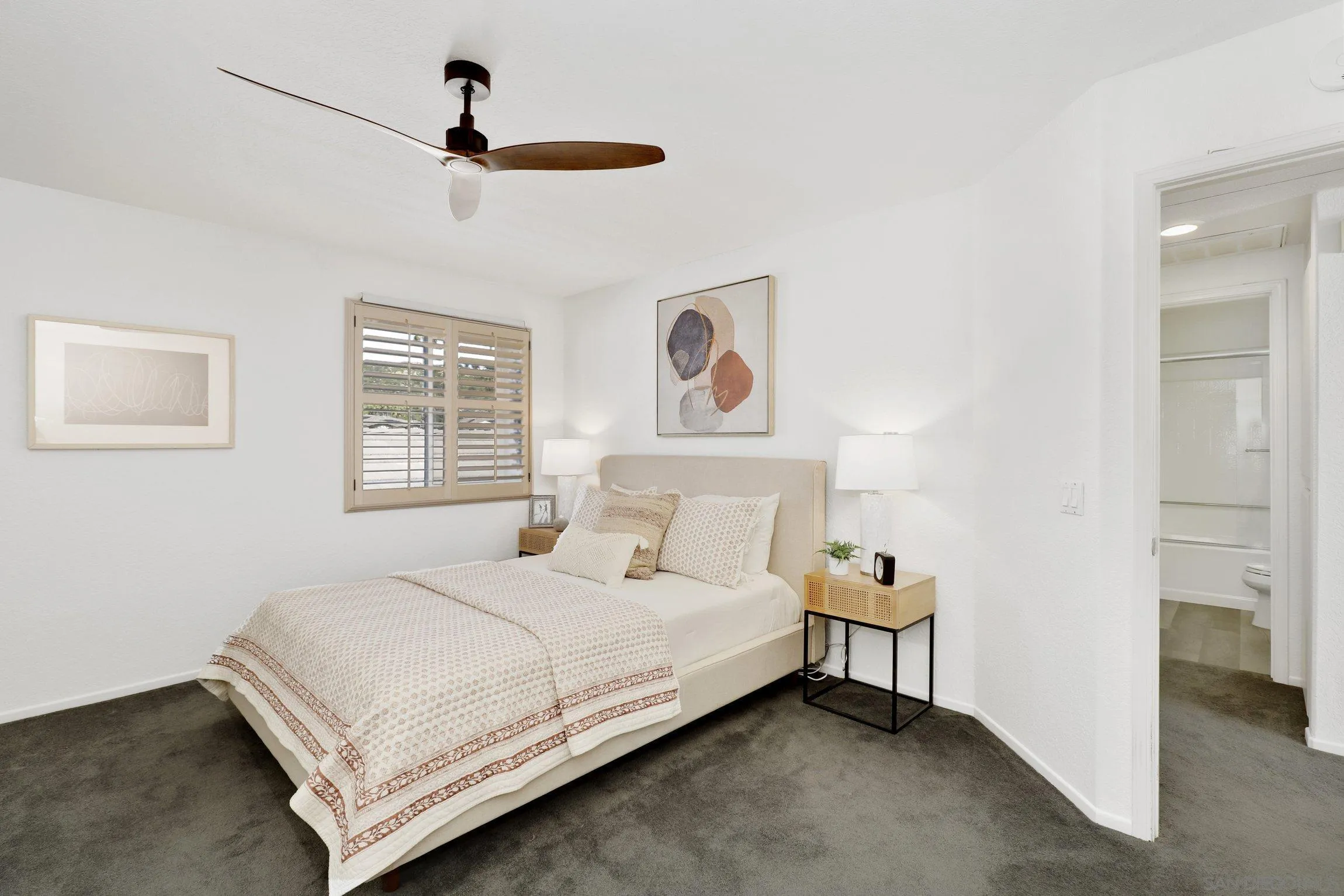 13957 Midland Road Poway, CA 92064 - Photo 12 of 26 a bedroom with a bed and a chandelier