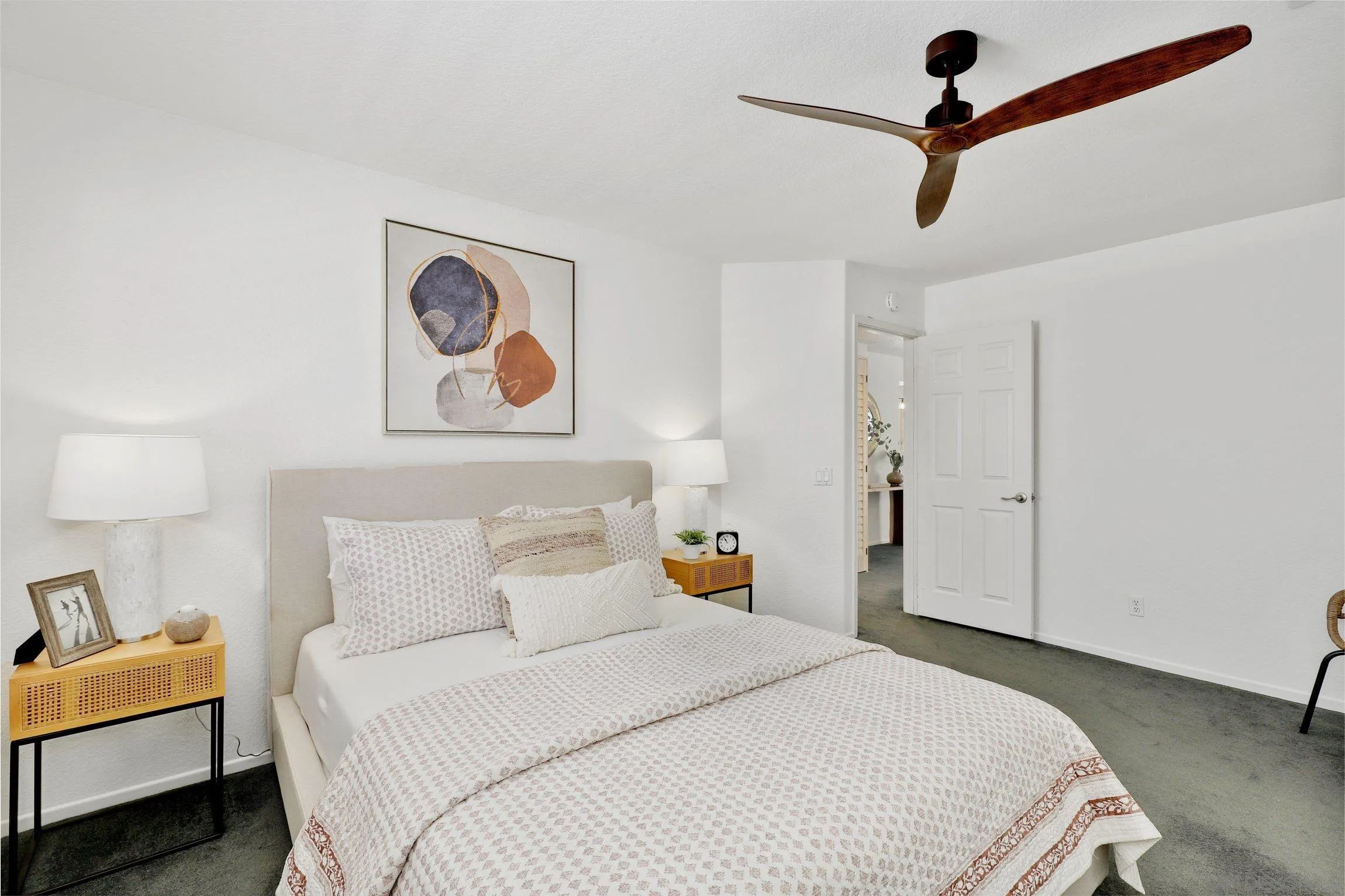 13957 Midland Road Poway, CA 92064 - Photo 13 of 26 a bedroom with a bed and a painting on the wall