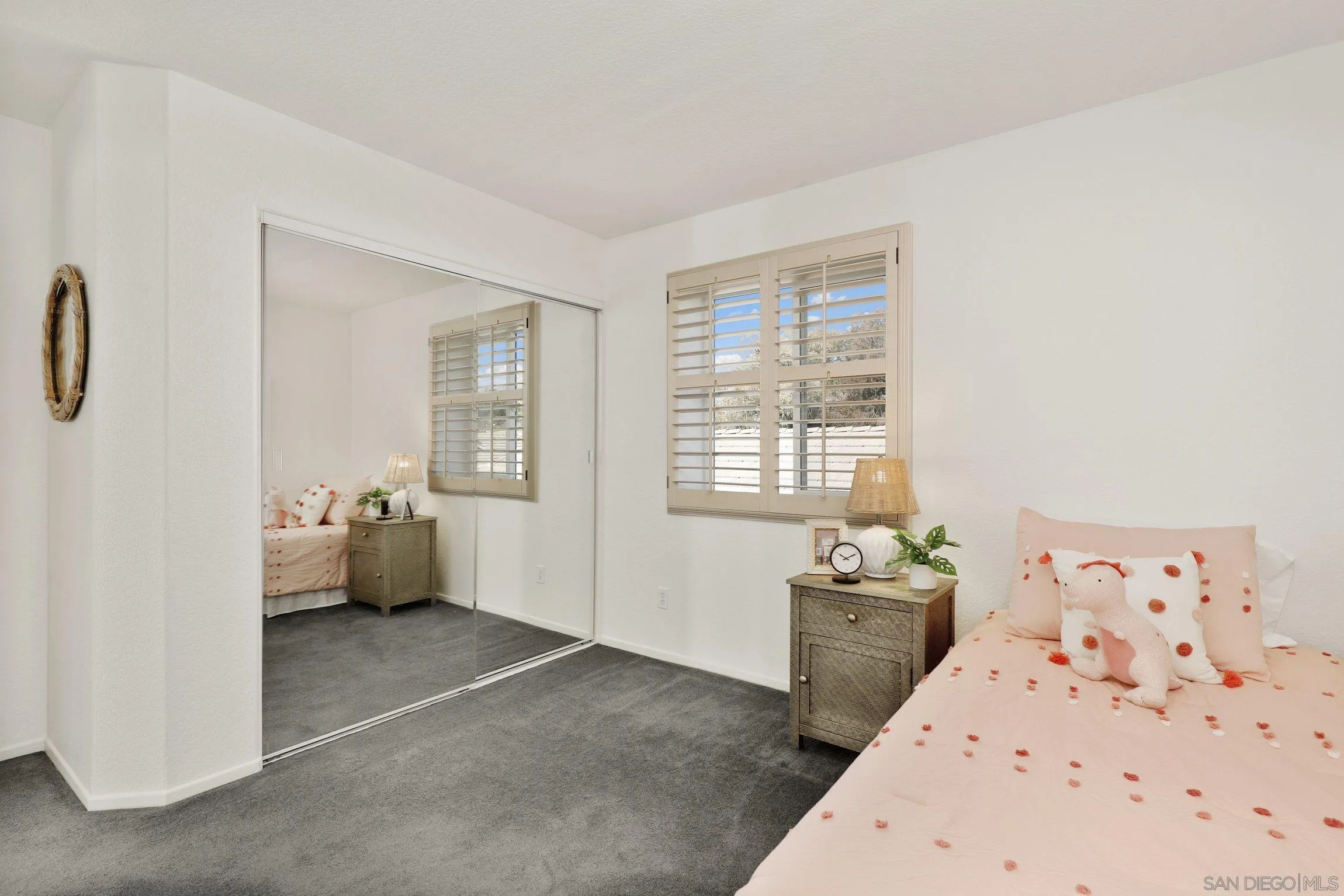 13957 Midland Road Poway, CA 92064 - Photo 18 of 26 a bedroom with a bed and a couch