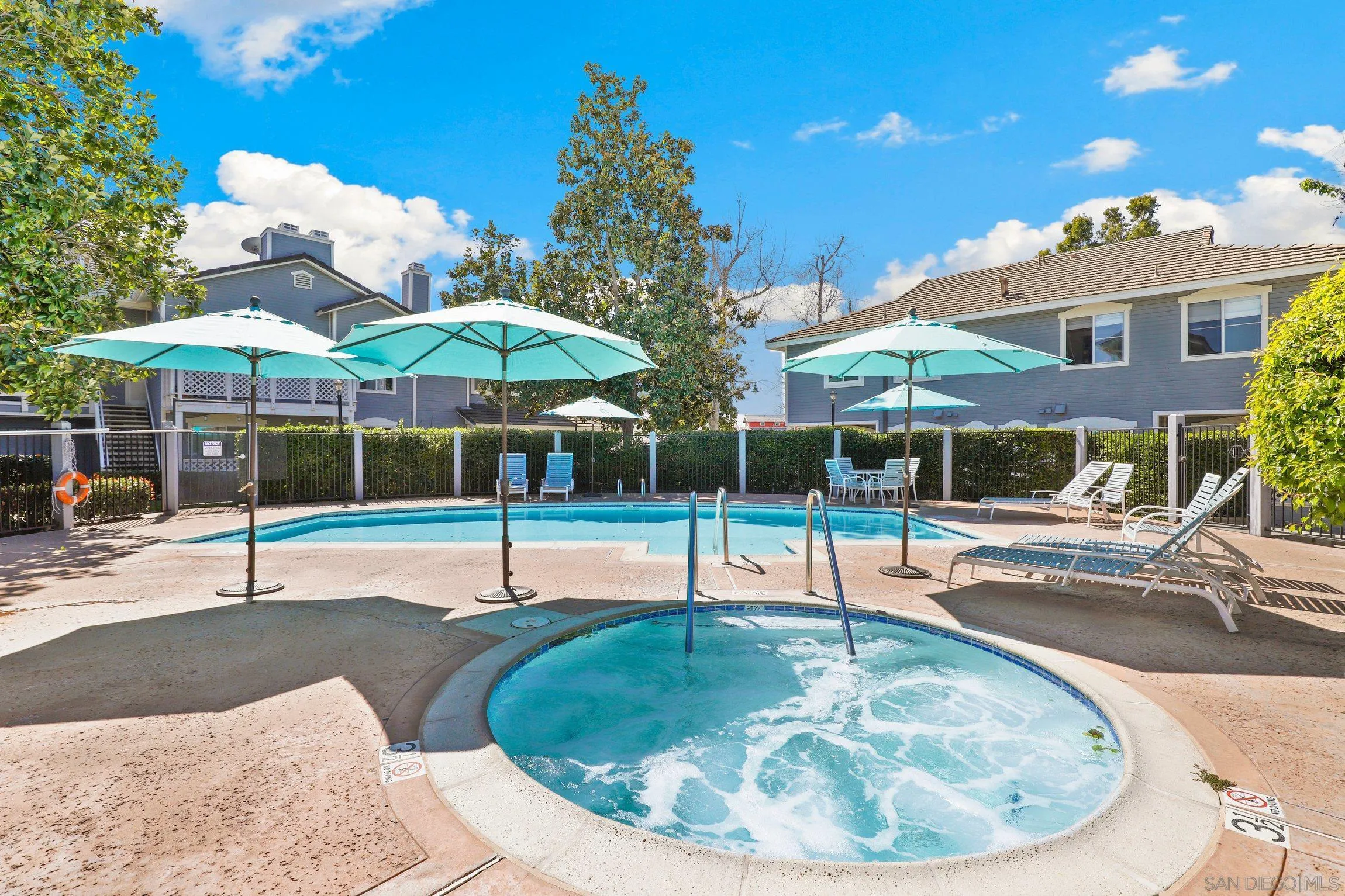 13957 Midland Road Poway, CA 92064 - Photo 24 of 26 a swimming pool with outdoor seating