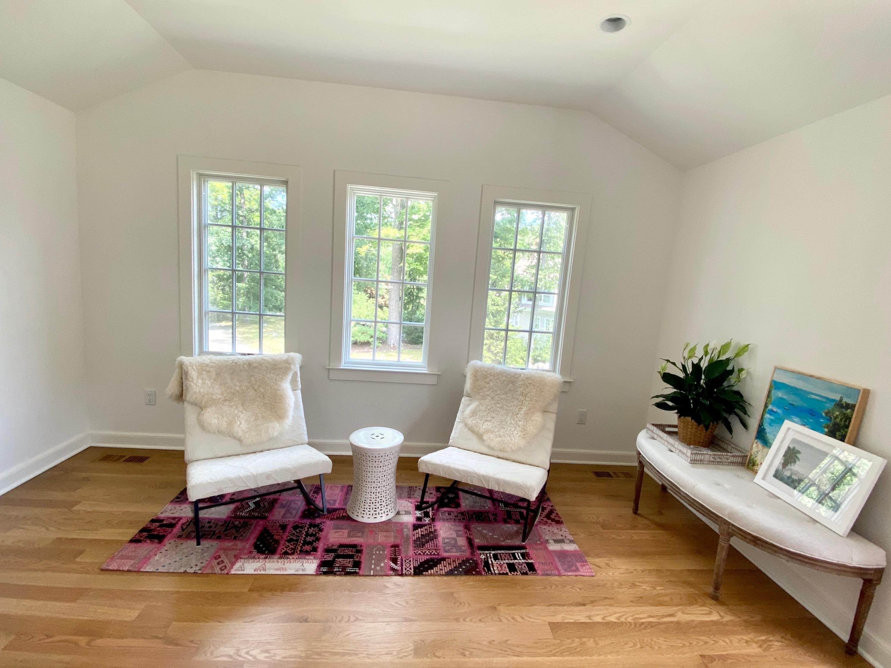19 Clapboard Hill Road New Canaan, CT 06840 - Photo 15 of 30 a living room with furniture rug and window