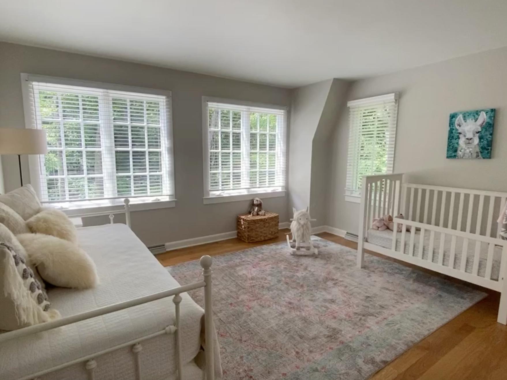 19 Clapboard Hill Road New Canaan, CT 06840 - Photo 19 of 30 a bedroom with furniture and windows