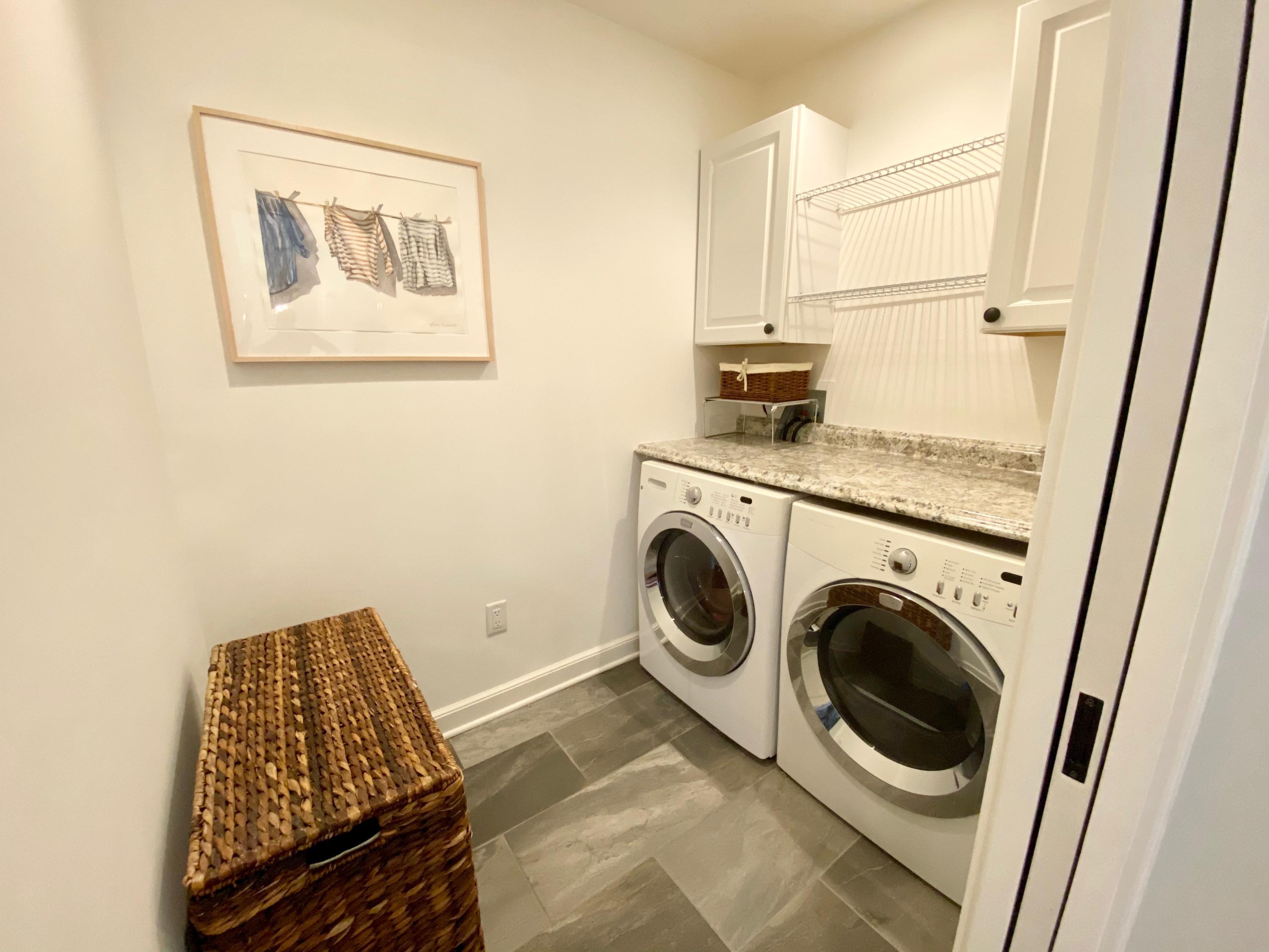 19 Clapboard Hill Road New Canaan, CT 06840 - Photo 23 of 30 a view of a bedroom with washer and dryer