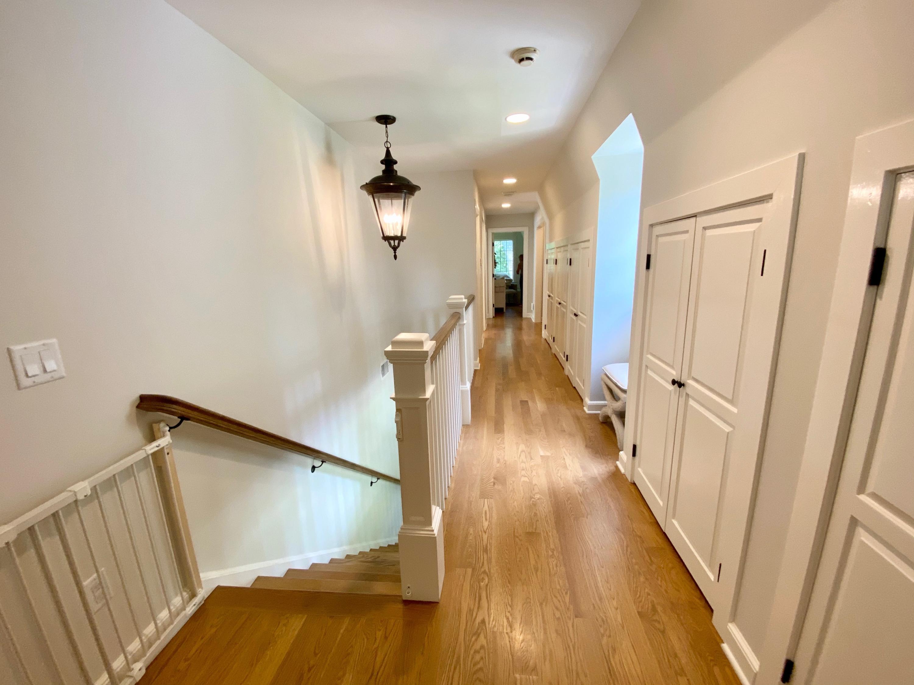19 Clapboard Hill Road New Canaan, CT 06840 - Photo 24 of 30 a view of a hallway with wooden floor