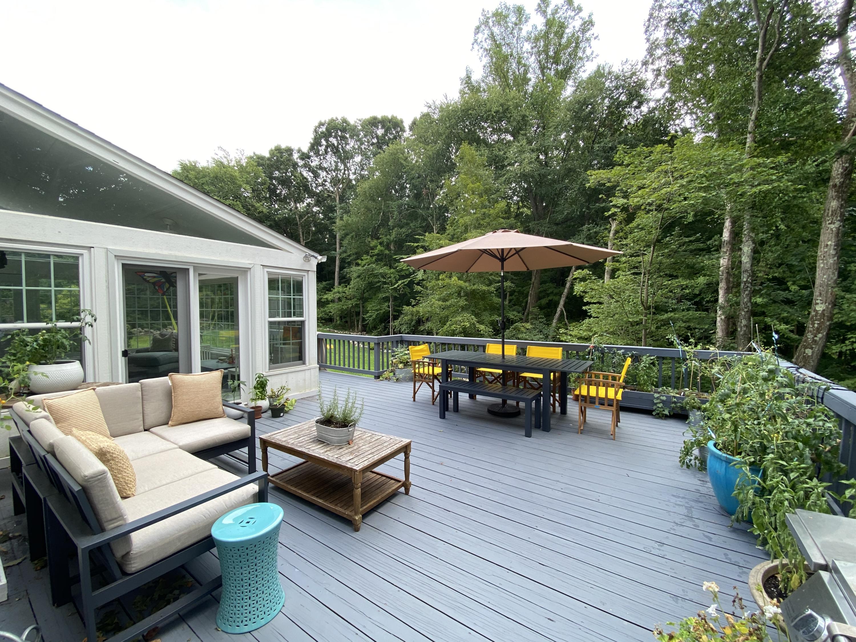 19 Clapboard Hill Road New Canaan, CT 06840 - Photo 29 of 30 a view of a patio with furniture and a patio