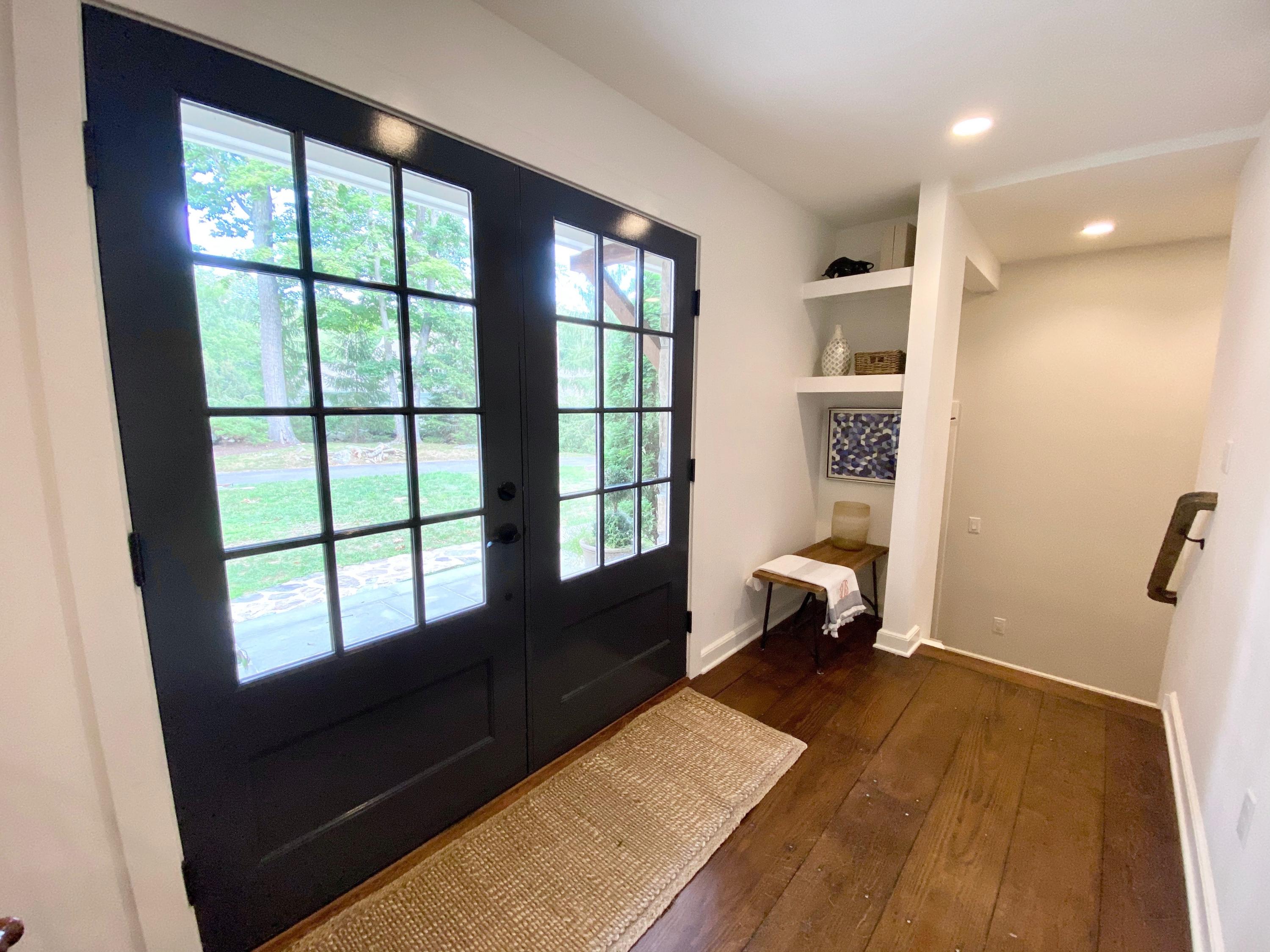 19 Clapboard Hill Road New Canaan, CT 06840 - Photo 4 of 30 a living room with furniture and a large window