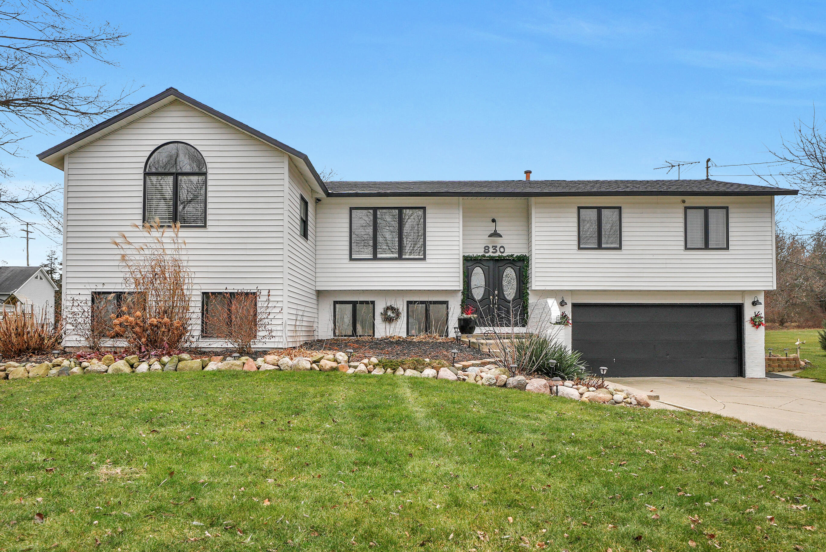 830 10 Mile Road Northwest Sparta, MI 49345 - Photo 1 of 48 Exterior