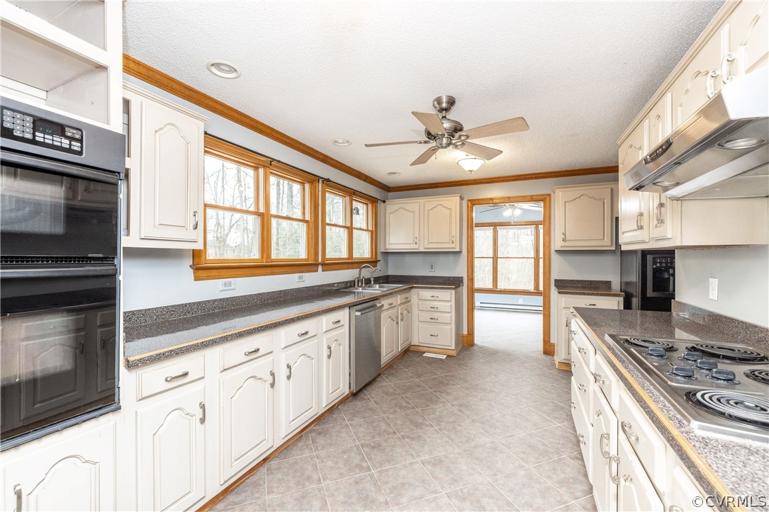 12602 Old Ridge Road Doswell, VA 23047 - Photo 12 of 37 Well equipped kitchen with built microwave and oven-ceramic tile floor