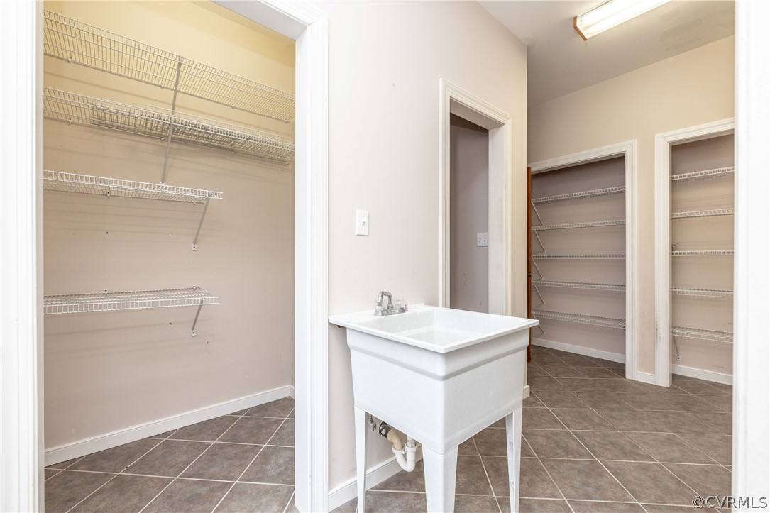 12602 Old Ridge Road Doswell, VA 23047 - Photo 17 of 37 Laundry area with side door and washer and dryer hookups