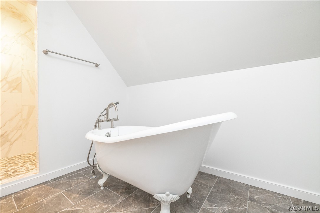 12602 Old Ridge Road Doswell, VA 23047 - Photo 33 of 37 Free standing soaking tub with tile floor