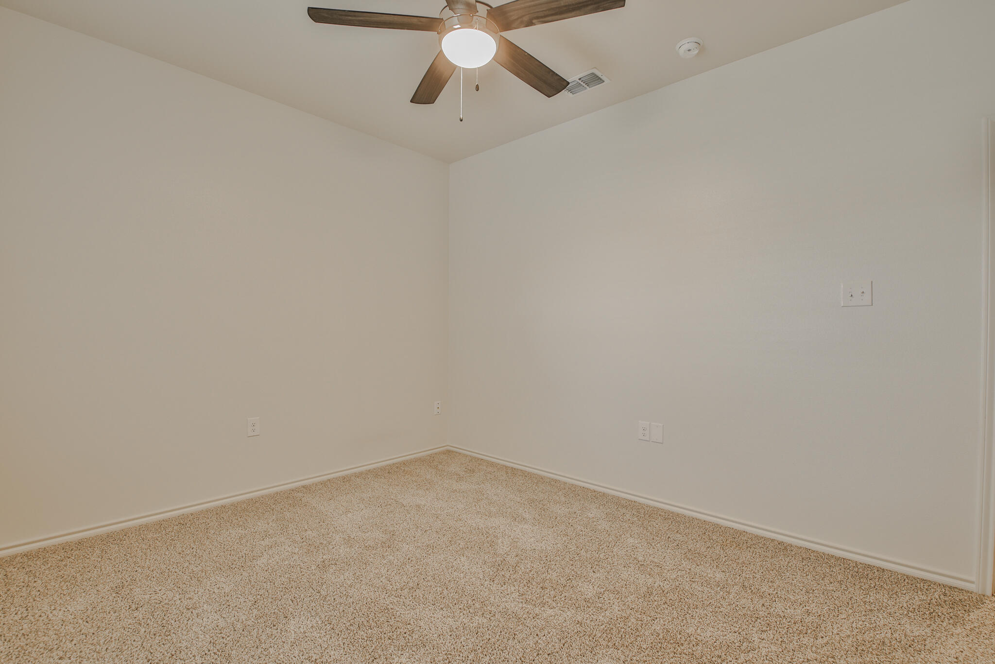 5512 Kemper Street Lubbock, TX 79416 - Photo 12 of 34 a view of an empty room