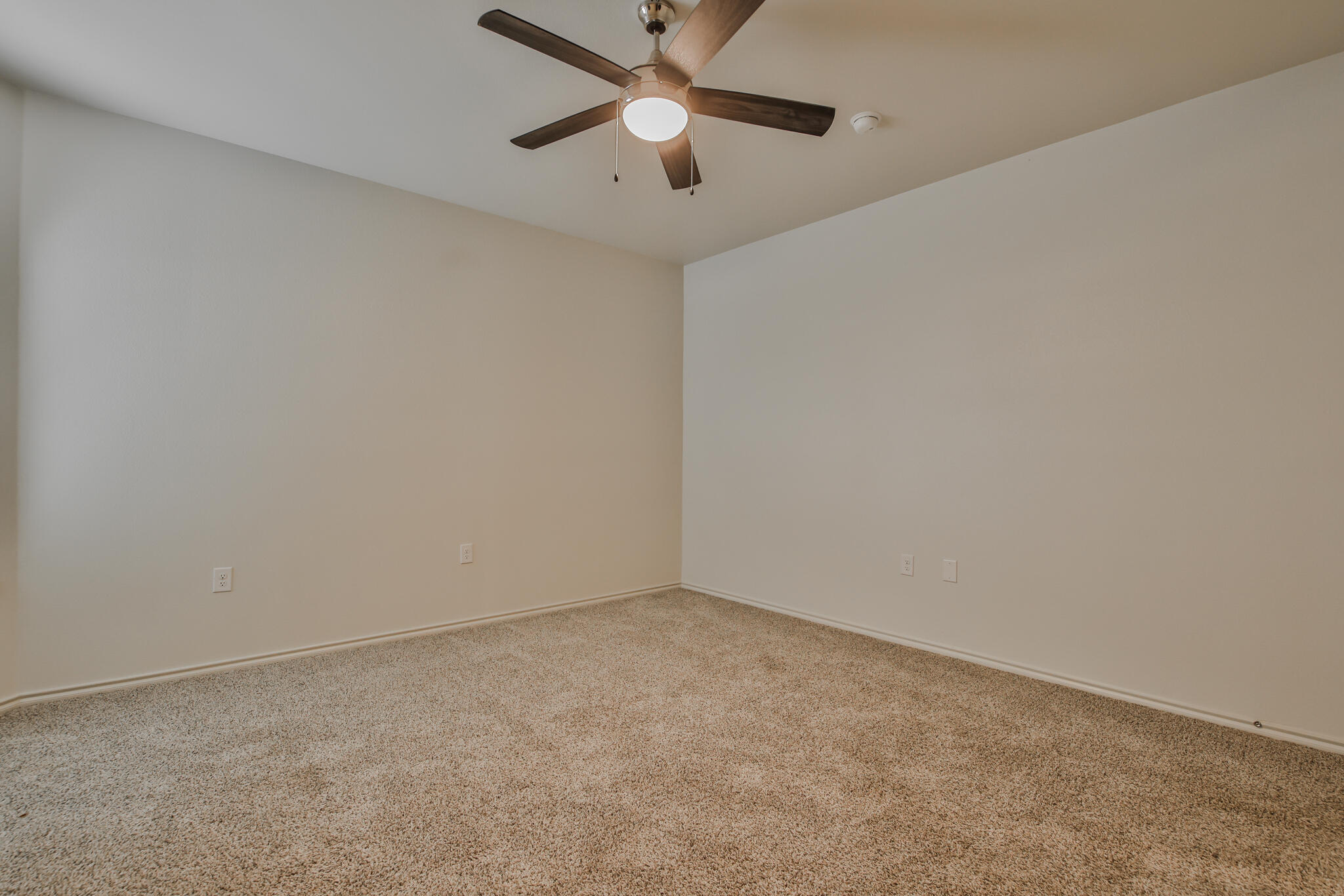 5512 Kemper Street Lubbock, TX 79416 - Photo 23 of 34 a view of room with a ceiling fan