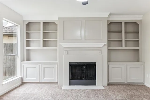 a living room with a fireplace