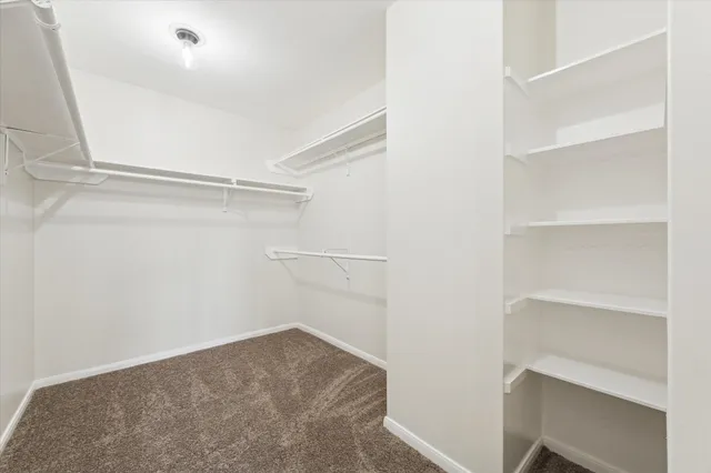 a view of an empty walk in closet