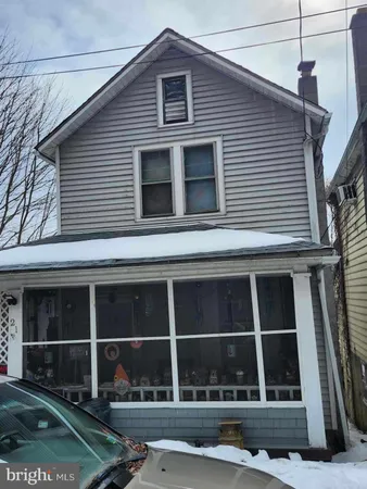 a front view of a house with windows