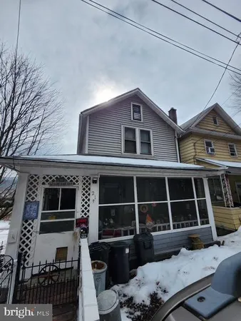 a front view of a house with windows