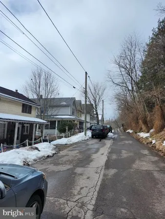 a view of a street with houses