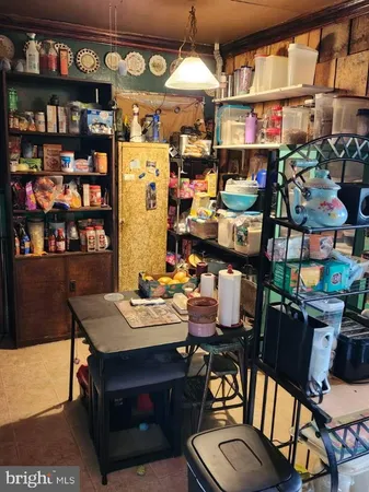 a view of a workspace with furniture