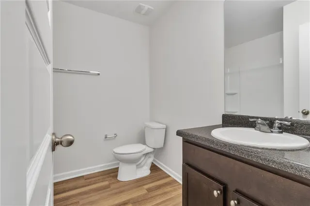 a bathroom with a sink a vanity and a mirror