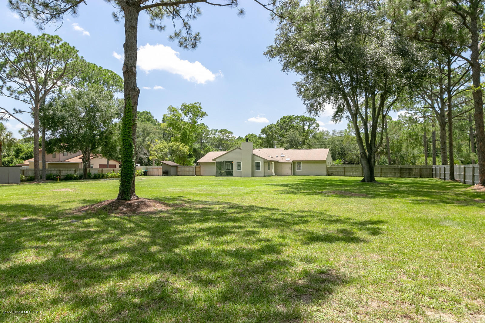 1511 Masters Road Northwest Palm Bay, FL 32907 - Photo 22 of 27 Backyard