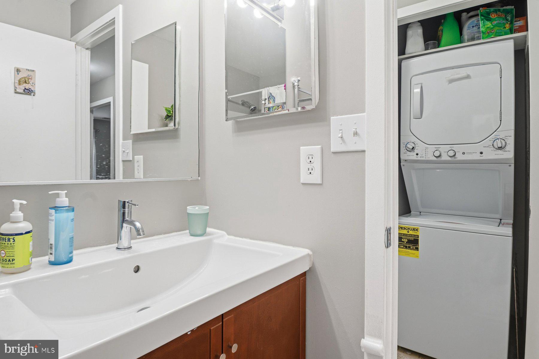 642 South Charles Street, Unit R 22 Baltimore, MD 21230 - Photo 26 of 26 a bathroom with a sink and a mirror