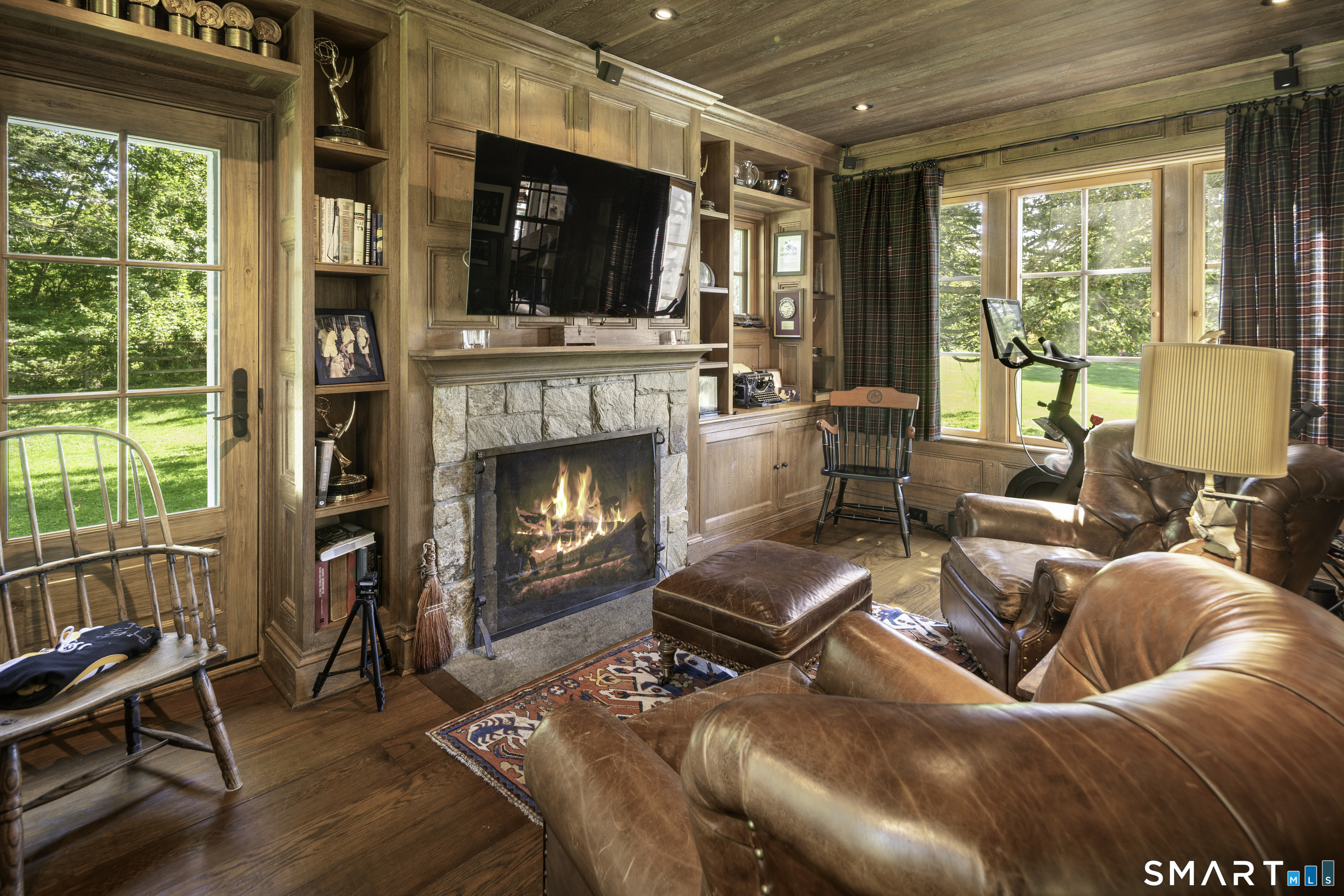 198 Hemlock Hill Road New Canaan, CT 06840 - Photo 11 of 32 a living room with furniture fireplace and flat screen tv