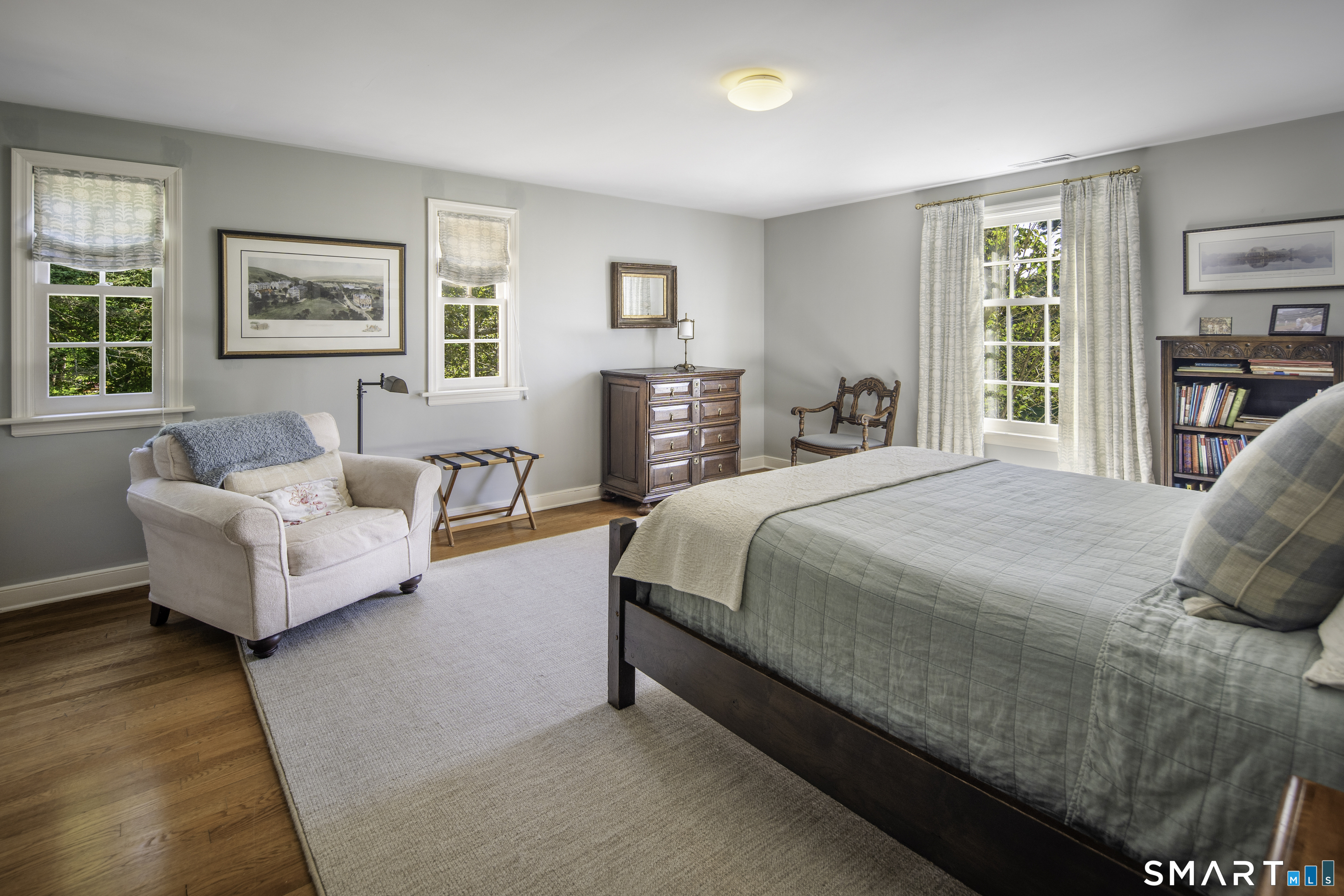 198 Hemlock Hill Road New Canaan, CT 06840 - Photo 16 of 32 a spacious bedroom with a bed and glass window