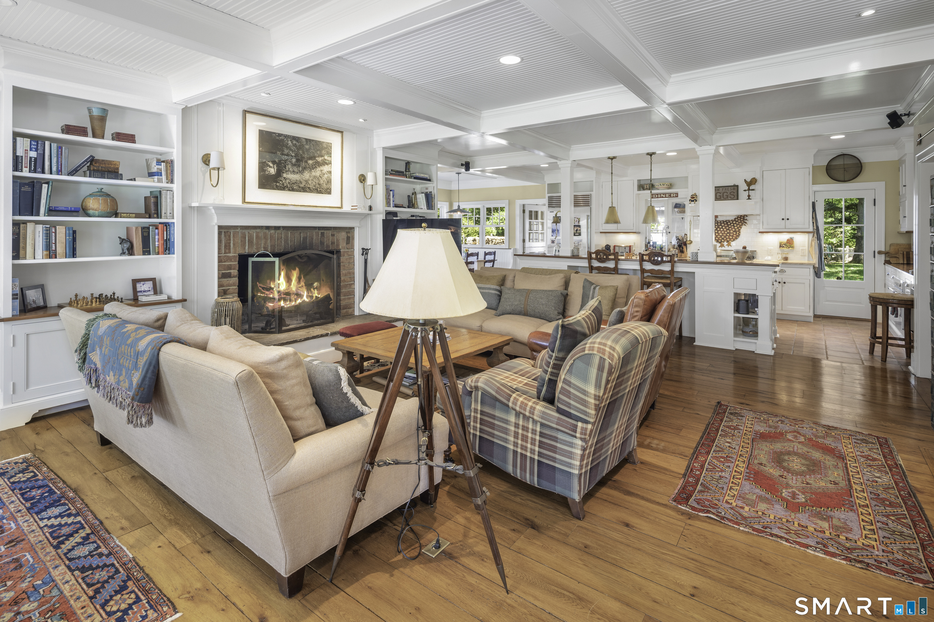 198 Hemlock Hill Road New Canaan, CT 06840 - Photo 17 of 32 a living room with furniture and a fireplace