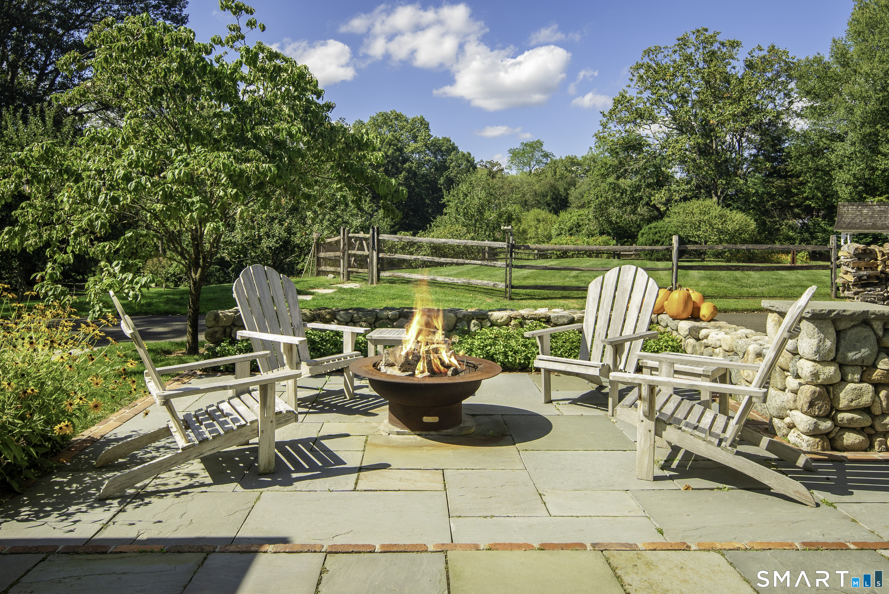 198 Hemlock Hill Road New Canaan, CT 06840 - Photo 25 of 32 a outdoor view with a sitting space