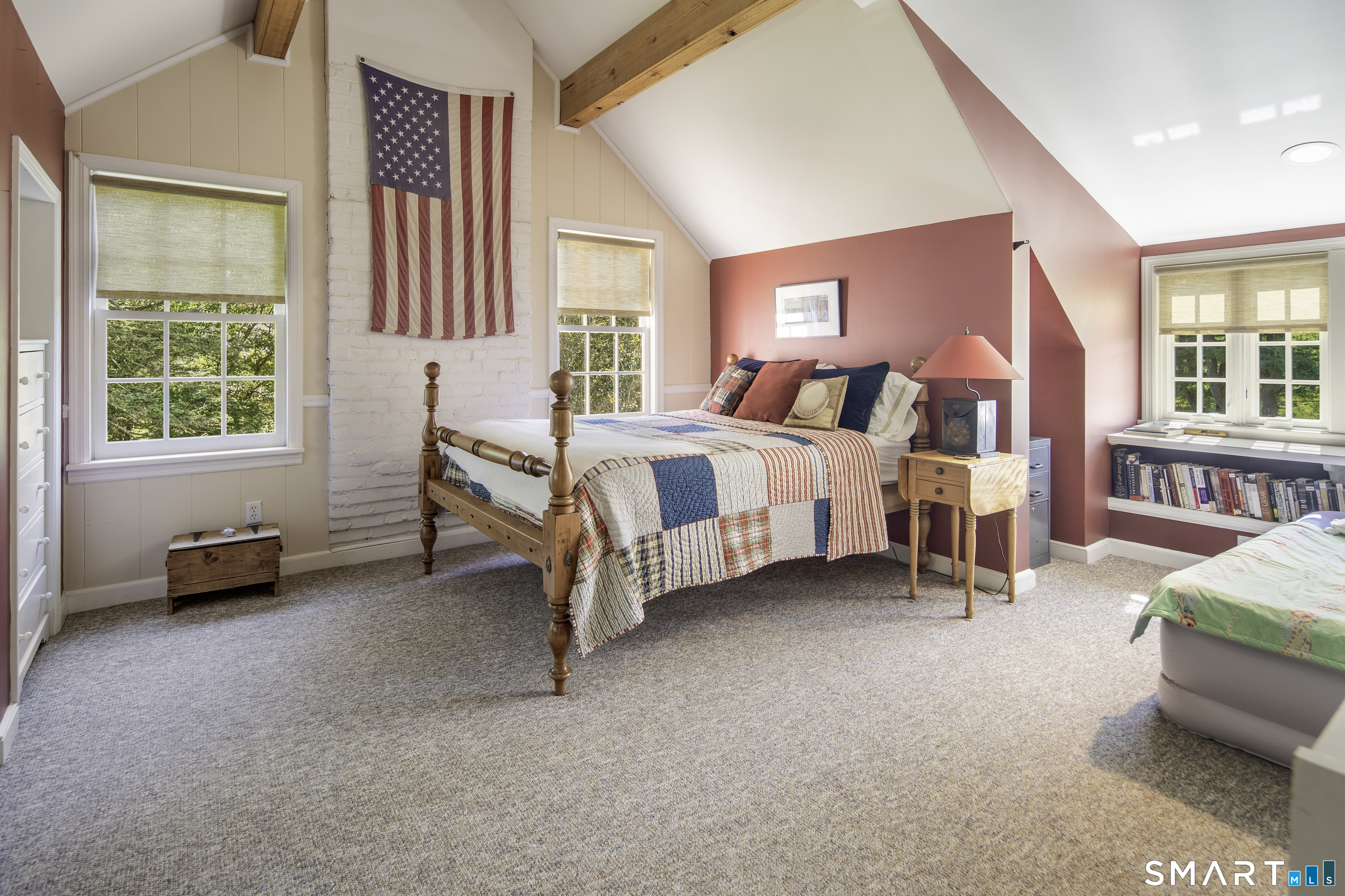 198 Hemlock Hill Road New Canaan, CT 06840 - Photo 26 of 32 a spacious bedroom with a bed and a large window