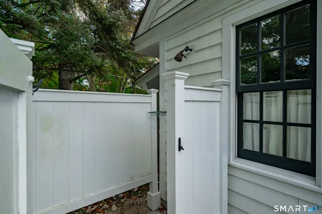 a view of a door and a window
