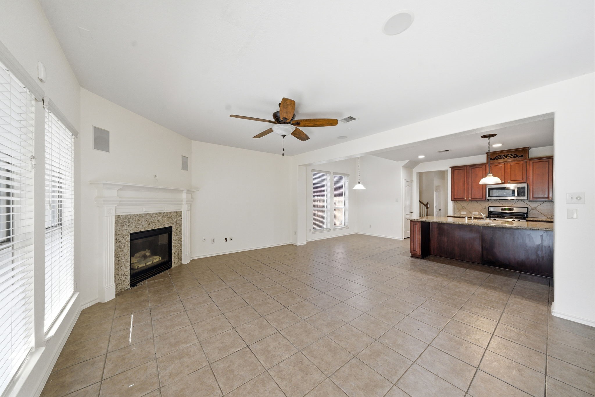 23139 Tranquil Spring Lane Katy, TX 77494 - Photo 6 of 22 Seamless open concept perfect for effortless entertaining.