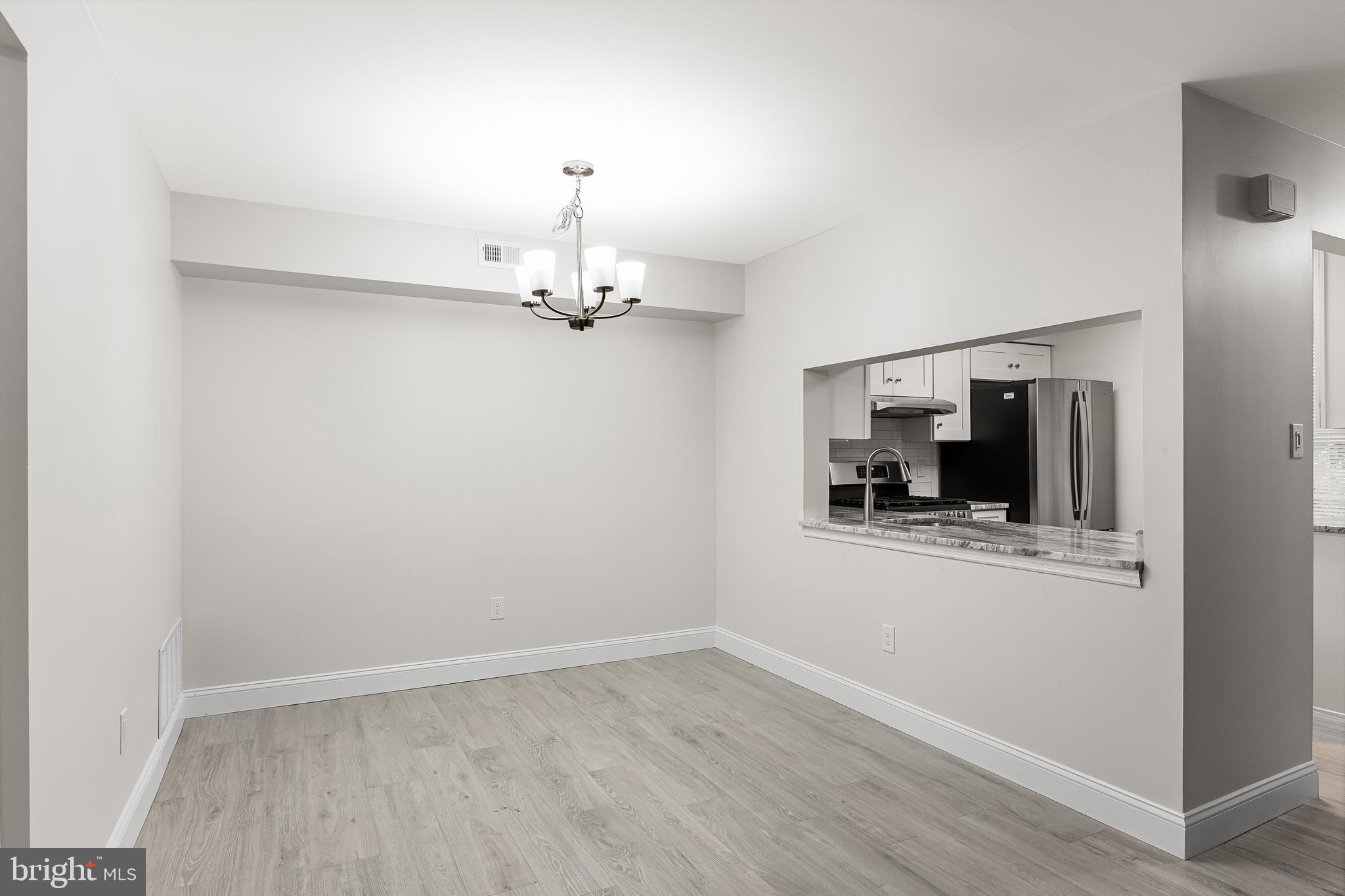 5003 A Albridge Way Mount Laurel, NJ 08054 - Photo 11 of 28 a view of a room with wooden floor kitchen and sink