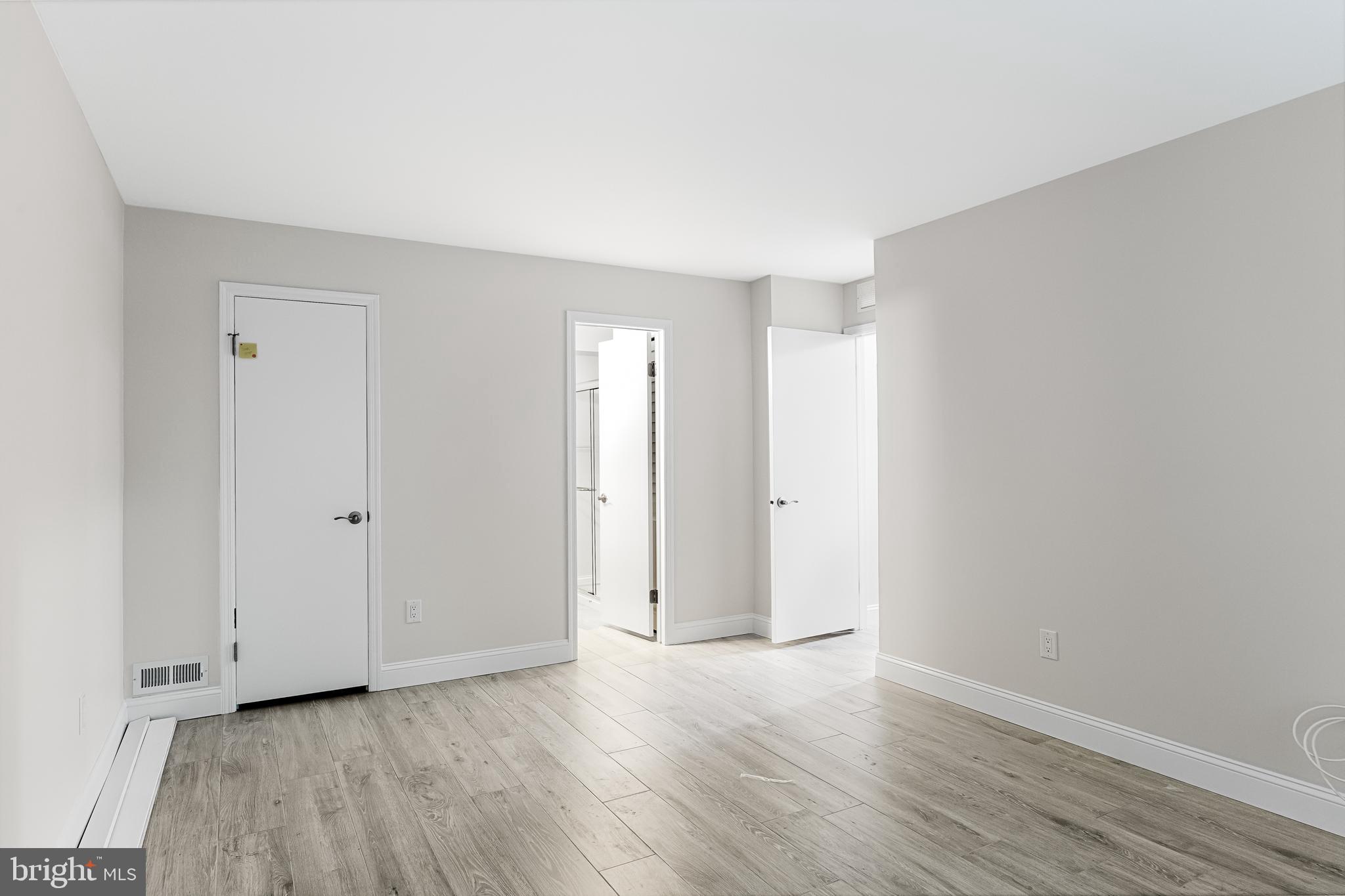 5003 A Albridge Way Mount Laurel, NJ 08054 - Photo 21 of 28 a view of an empty room and wooden floor