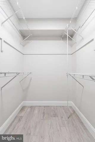 a view of a room with racks on the wall