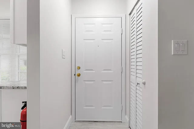 a view of front door with hallway