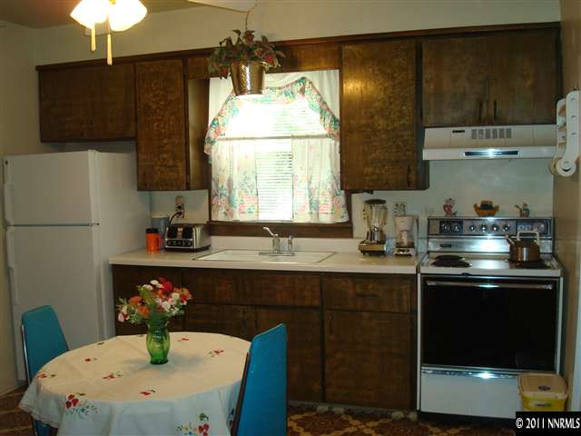 135 La Rue Avenue Reno, NV 89509 - Photo 5 of 12 a kitchen with a sink cabinets and window