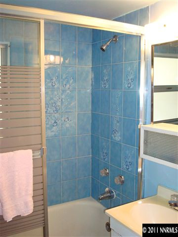 135 La Rue Avenue Reno, NV 89509 - Photo 8 of 12 a bathroom with a shower and a sink