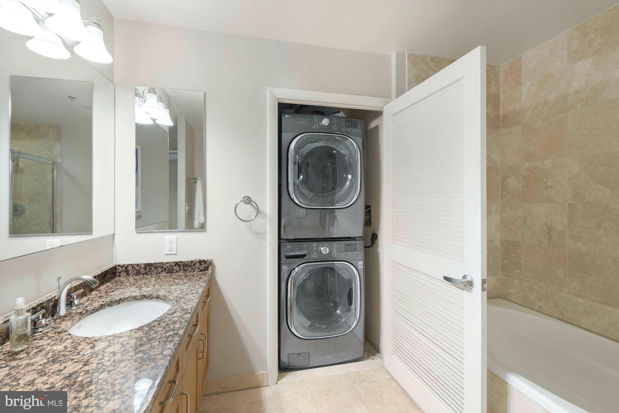 1700 Kalorama Road Northwest, Unit 207 Washington, DC 20009 - Photo 20 of 34 a bathroom with a sink and a mirror