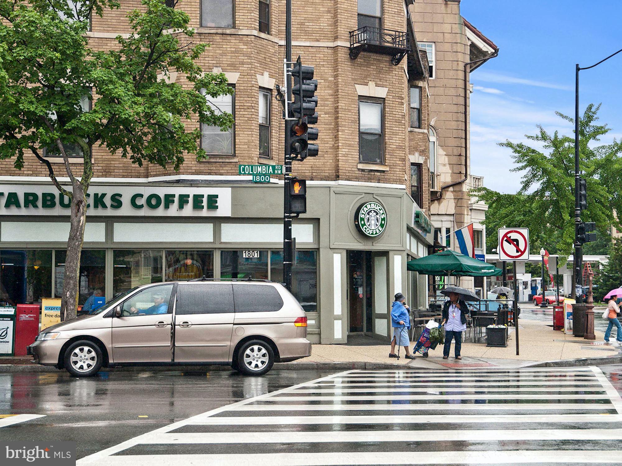 1700 Kalorama Road Northwest, Unit 207 Washington, DC 20009 - Photo 31 of 34 a view of a cars park in front of a building