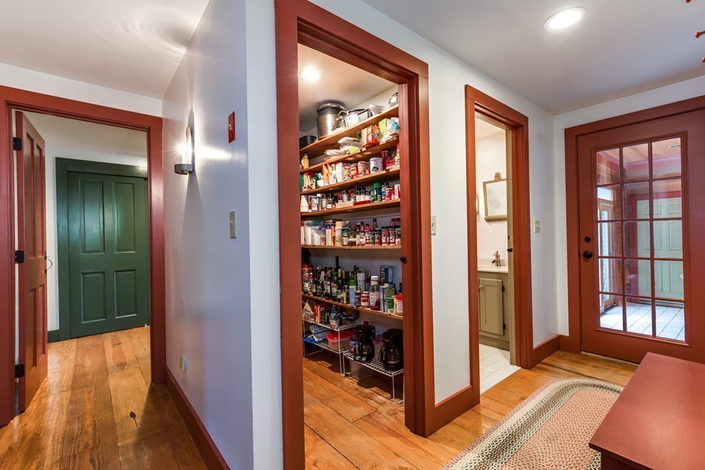 145 Beaman Road Princeton, MA 01541 - Photo 29 of 30 a view of a hallway with wooden floor and windows