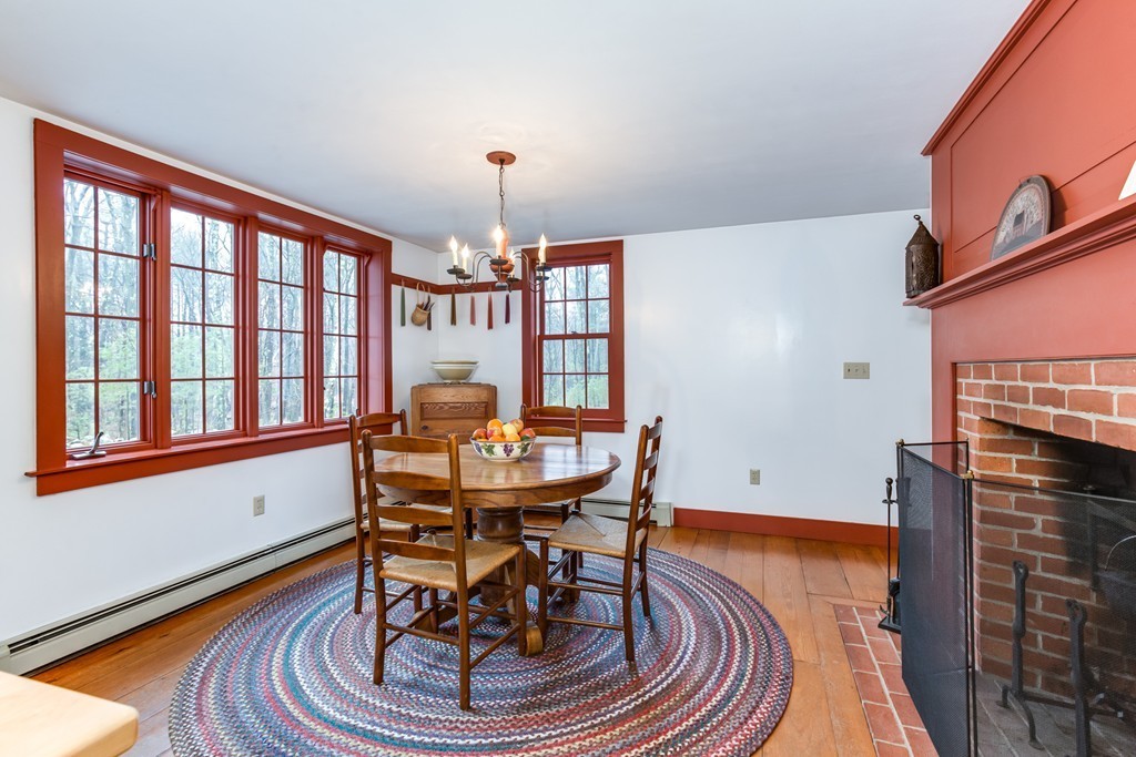 145 Beaman Road Princeton, MA 01541 - Photo 8 of 30 a work room with furniture and a chandelier