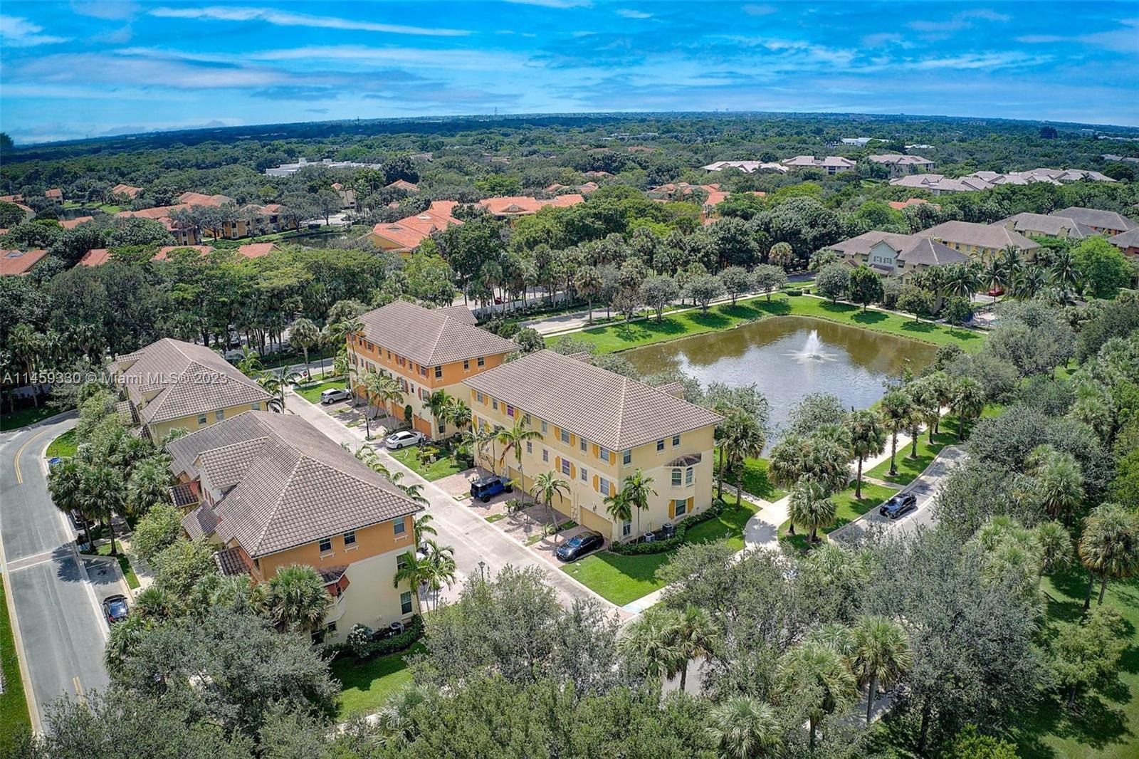 3920 Passion Flower Road Coconut Creek, FL 33073 - Photo 32 of 37 an aerial view of multiple house