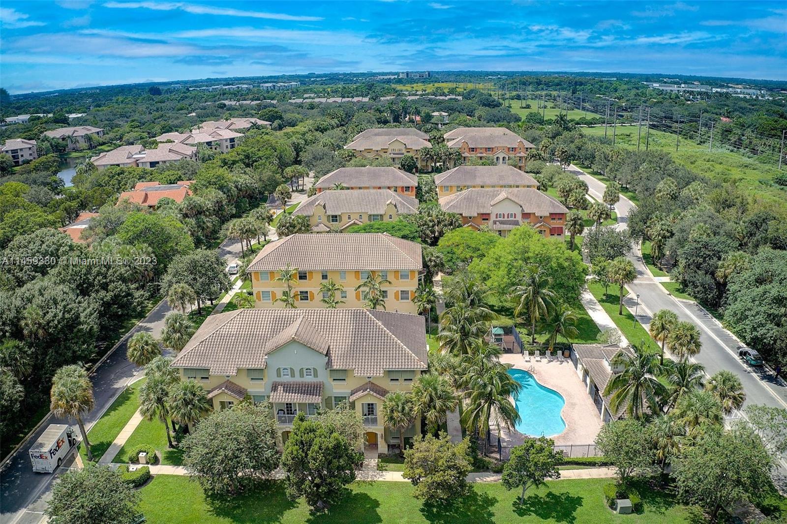 3920 Passion Flower Road Coconut Creek, FL 33073 - Photo 36 of 37 an aerial view of multiple house