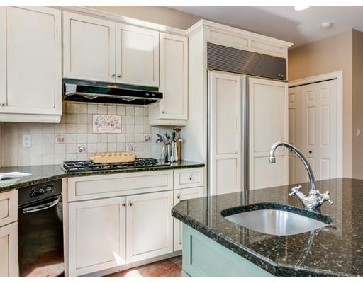65 Old Farm Road Newton, MA 02459 - Photo 8 of 30 a kitchen with granite countertop a sink stainless steel appliances and cabinets